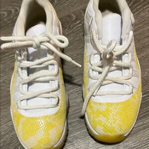 Jordan White and Yellow Athletic Shoes